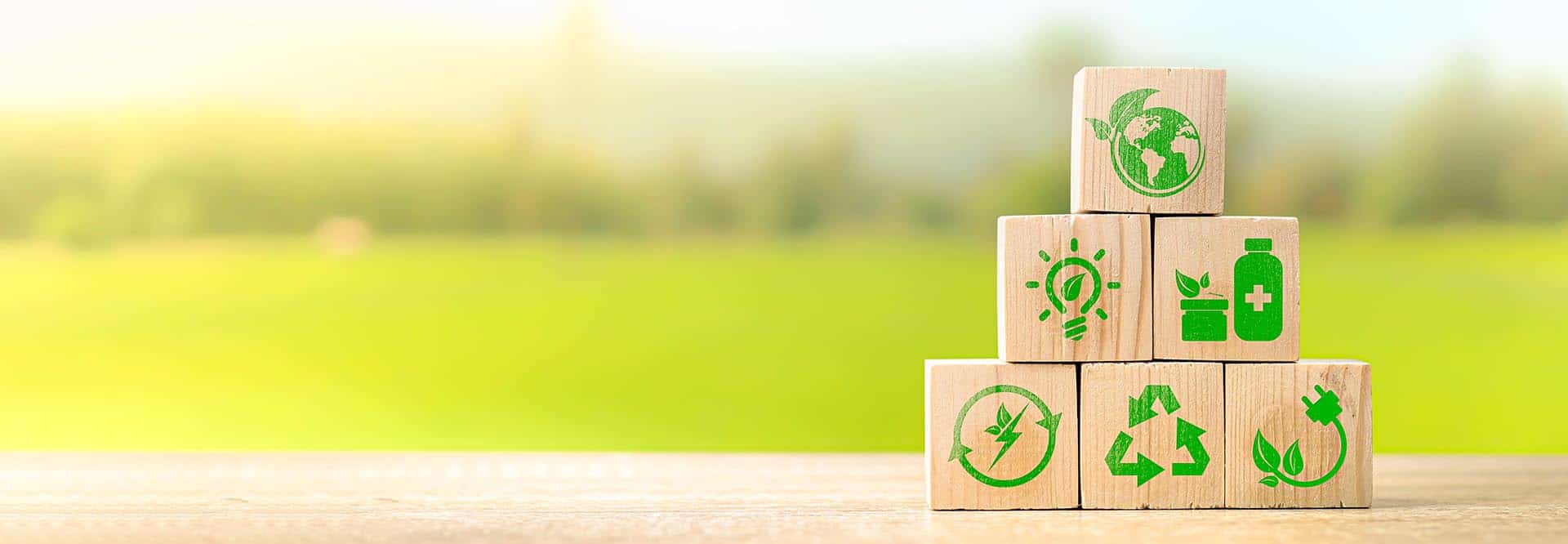 Wooden,Cubes,With,Eco,Globe,On,Blurred,Nature,Background,,Internet